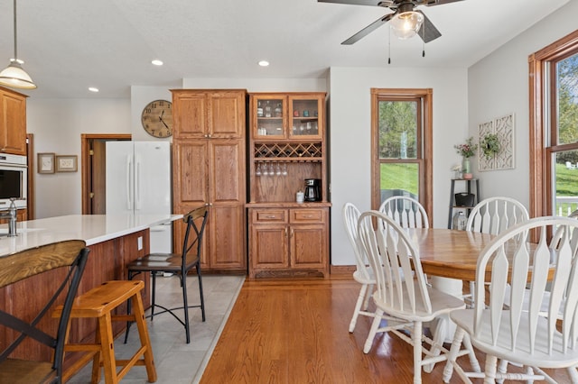 6715 Eldorado Way, Leon Twp, MN 55009 - dining area with a ceiling fan, recessed lighting, and light wood-type flooring