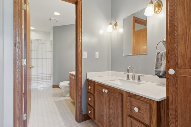 6715 Eldorado Way, Leon Twp, MN 55009 - full bath with vanity, toilet, and a shower with shower curtain