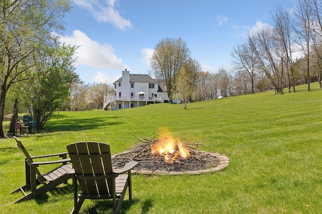 6715 Eldorado Way, Leon Twp, MN 55009 - view of grassy yard featuring a fire pit