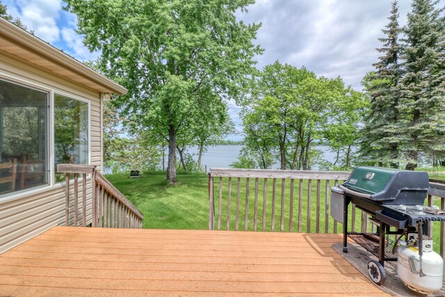 33397 Pickerel View Dr, Richville, MN 56576 - wooden deck with a lawn, a water view, and a grill