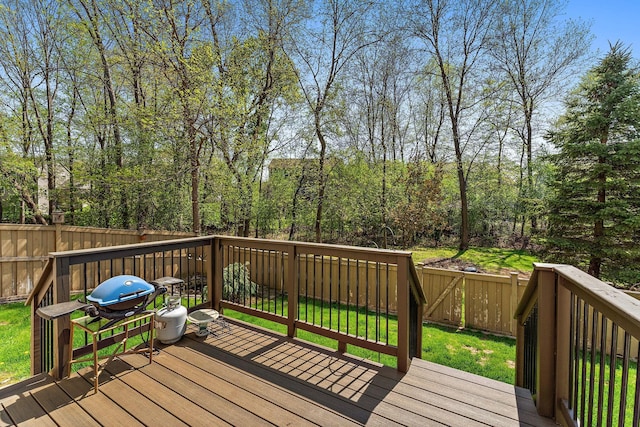 wooden deck with area for grilling