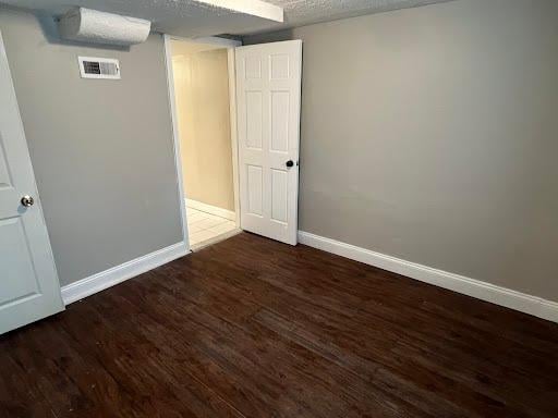 1541 Charles Ave, Saint Paul, MN 55104 - empty room featuring baseboards and wood finished floors
