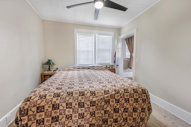 110 7th St SE, Little Falls, MN 56345 - carpeted bedroom featuring a ceiling fan, baseboards, and crown molding