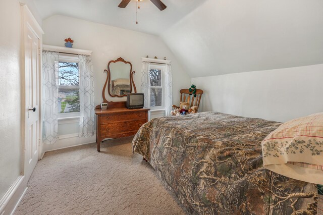 110 7th St SE, Little Falls, MN 56345 - bedroom with vaulted ceiling, carpet flooring, ceiling fan, and baseboards