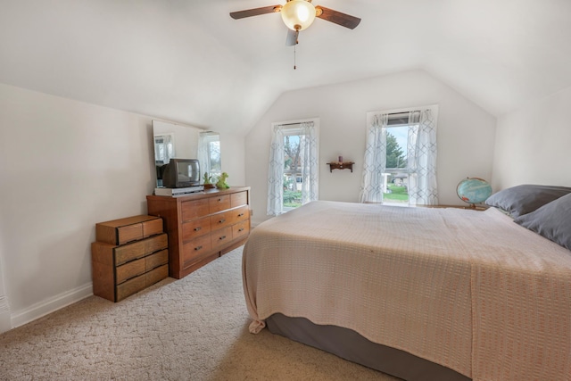 110 7th St SE, Little Falls, MN 56345 - bedroom featuring lofted ceiling, a ceiling fan, baseboards, and carpet flooring