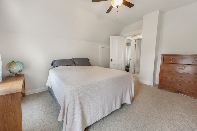110 7th St SE, Little Falls, MN 56345 - bedroom featuring light colored carpet, vaulted ceiling, baseboards, and a ceiling fan
