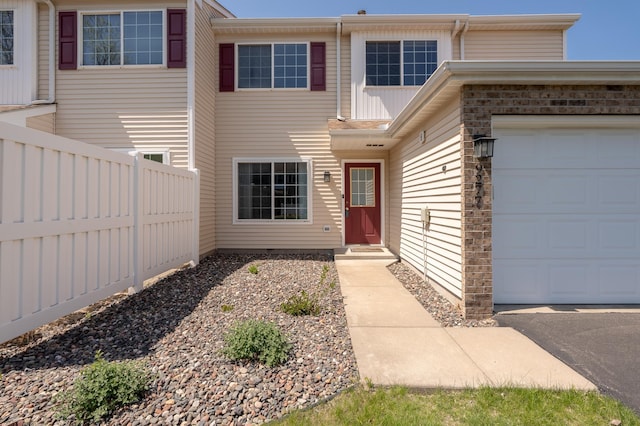 9277 Inland Ln N, Maple Grove, MN 55311 - entrance to property with fence and a garage