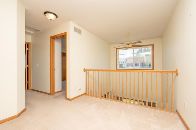 9277 Inland Ln N, Maple Grove, MN 55311 - carpeted spare room with a ceiling fan and baseboards