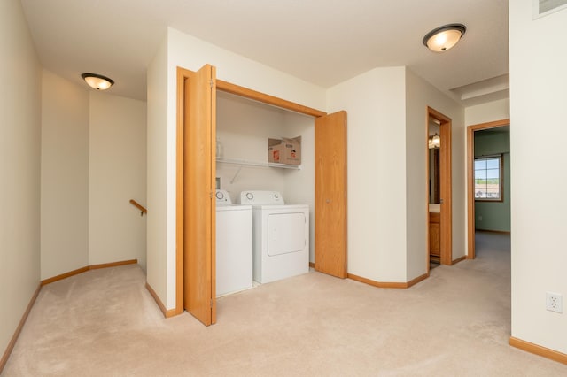 9277 Inland Ln N, Maple Grove, MN 55311 - clothes washing area with independent washer and dryer, light colored carpet, and baseboards