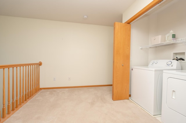 9277 Inland Ln N, Maple Grove, MN 55311 - washroom featuring washer and clothes dryer, light colored carpet, and baseboards