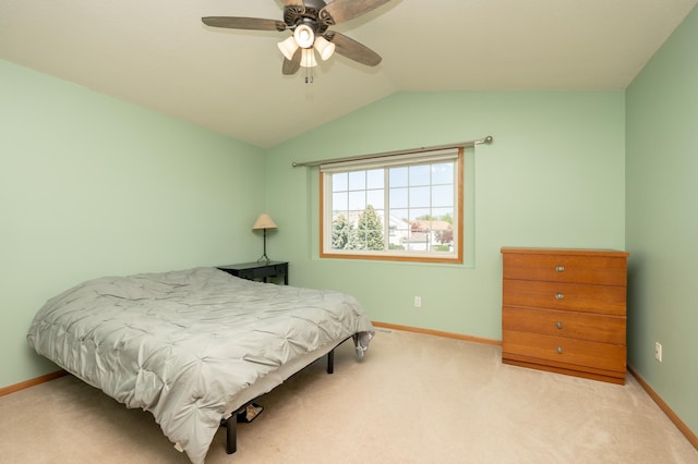 9277 Inland Ln N, Maple Grove, MN 55311 - carpeted bedroom featuring baseboards, vaulted ceiling, and ceiling fan