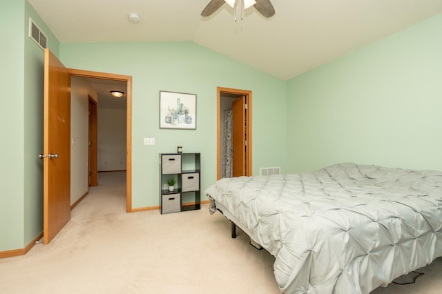 9277 Inland Ln N, Maple Grove, MN 55311 - bedroom with vaulted ceiling, light carpet, baseboards, and ceiling fan