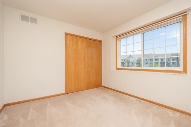 9277 Inland Ln N, Maple Grove, MN 55311 - carpeted spare room with baseboards