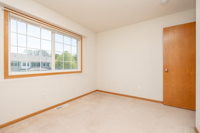 9277 Inland Ln N, Maple Grove, MN 55311 - carpeted empty room with baseboards