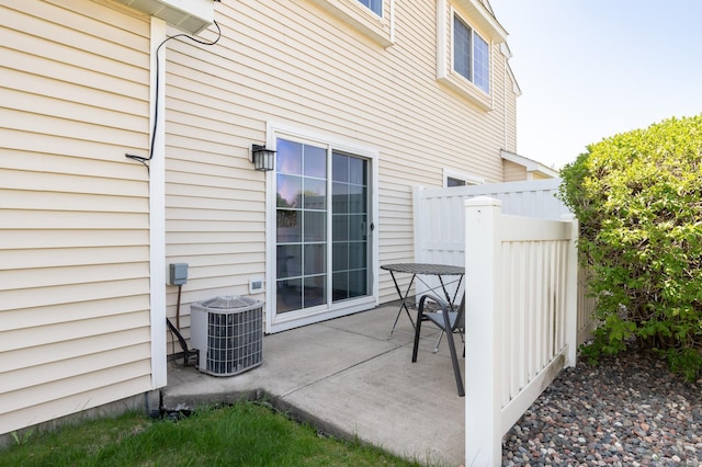 9277 Inland Ln N, Maple Grove, MN 55311 - view of patio / terrace featuring cooling unit and fence