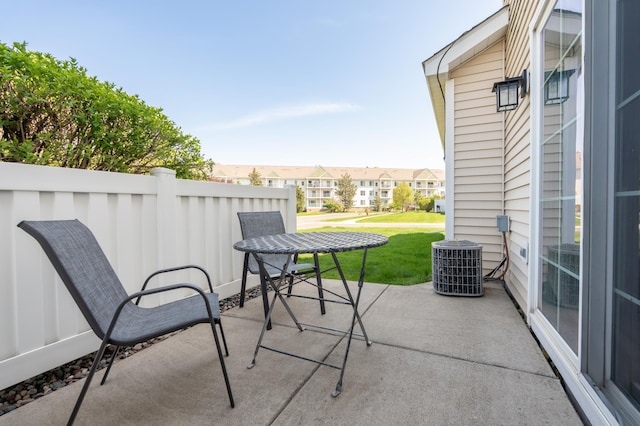 9277 Inland Ln N, Maple Grove, MN 55311 - view of patio / terrace with cooling unit and a residential view