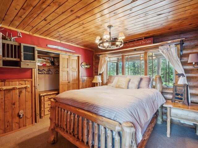 15464 Birch Narrows Rd, Crosslake, MN 56472 - bedroom with wood ceiling, carpet floors, multiple windows, wainscoting, and a chandelier
