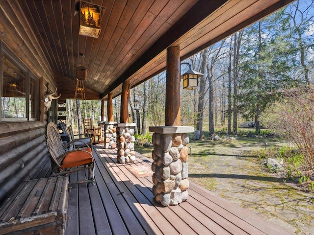 15464 Birch Narrows Rd, Crosslake, MN 56472 - wooden deck with a porch