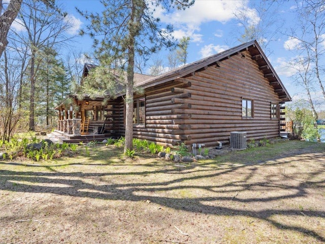 15464 Birch Narrows Rd, Crosslake, MN 56472 - view of home's exterior with log exterior and central air condition unit