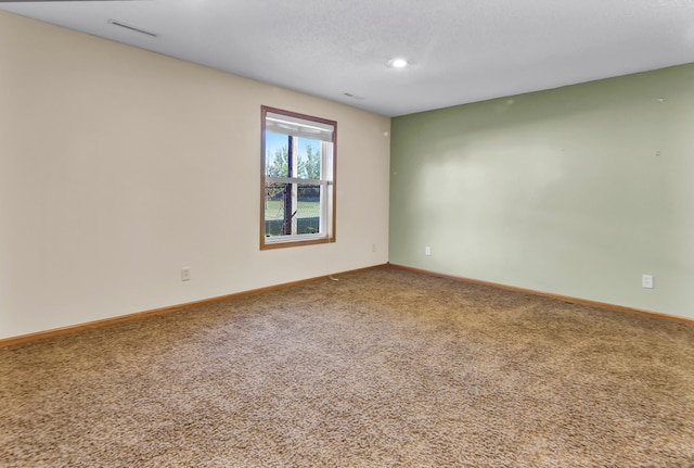 809 3rd Ave SE, Cold Spring, MN 56320 - empty room with carpet flooring, baseboards, and recessed lighting