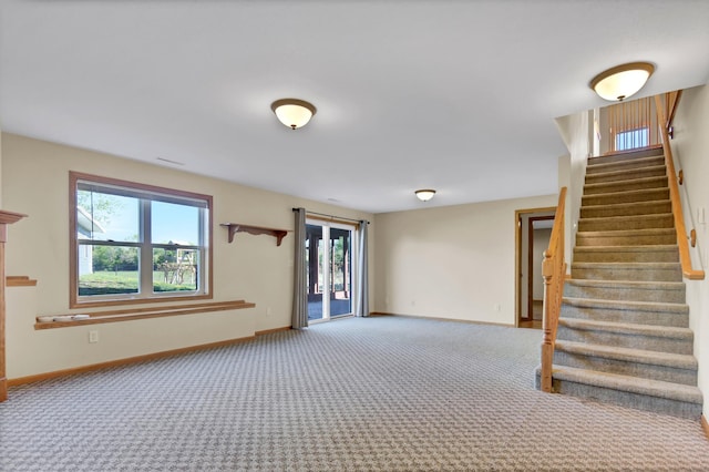 809 3rd Ave SE, Cold Spring, MN 56320 - carpeted empty room with plenty of natural light, stairs, and baseboards