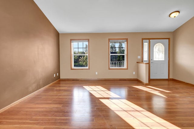 809 3rd Ave SE, Cold Spring, MN 56320 - foyer with plenty of natural light, wood finished floors, and baseboards