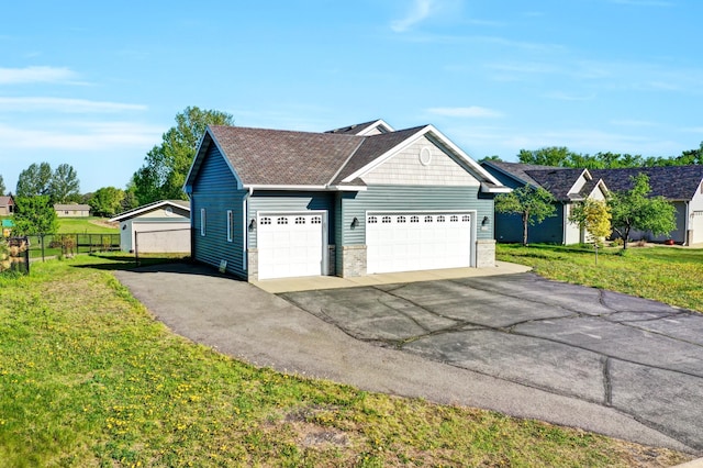 809 3rd Ave SE, Cold Spring, MN 56320 - view of front facade with asphalt driveway and roof with shingles
