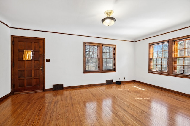 5028-5030 Nicollet Ave S, Minneapolis, MN 55419 - spare room with hardwood / wood-style flooring, baseboards, and ornamental molding