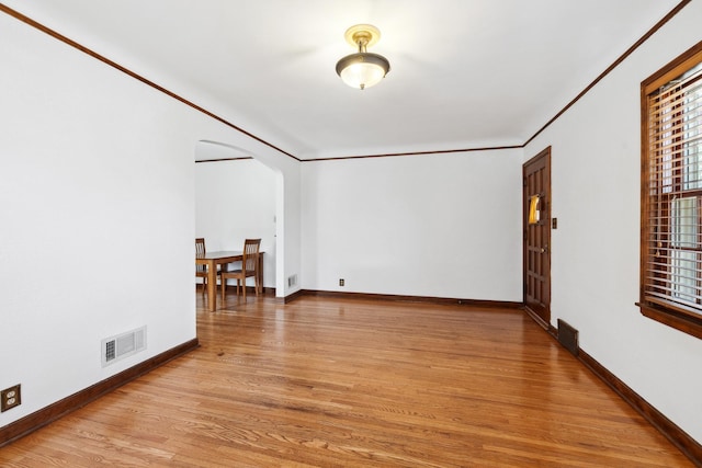 5028-5030 Nicollet Ave S, Minneapolis, MN 55419 - additional living space with light wood-type flooring, arched walkways, and baseboards
