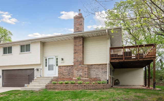 2313 122nd St, Burnsville, MN 55337 - view of front of property featuring a wooden deck, a garage, a chimney, brick siding, and concrete driveway