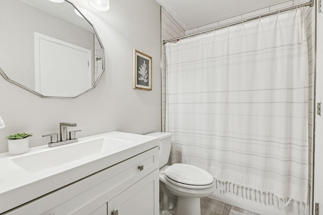 2313 122nd St, Burnsville, MN 55337 - bathroom featuring toilet and vanity