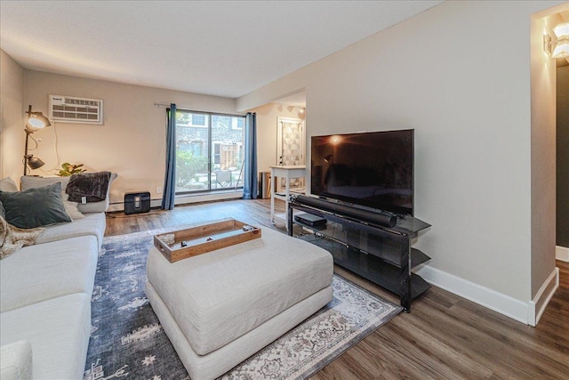 4524 Cedar Lake Rd S Unit 3, Saint Louis Park, MN 55416 - living room featuring an AC wall unit, wood finished floors, baseboards, and baseboard heating