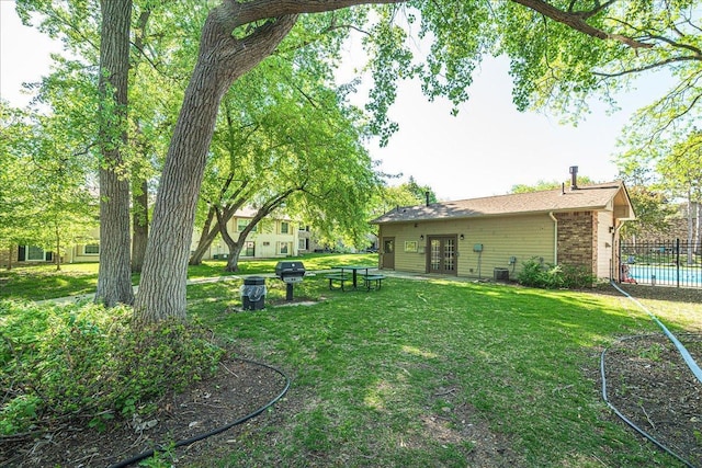 4524 Cedar Lake Rd S Unit 3, Saint Louis Park, MN 55416 - view of yard featuring french doors