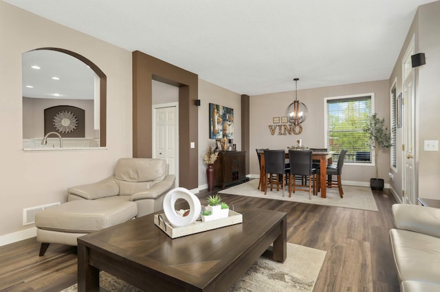 4323 Victor Path Unit 1, Hugo, MN 55038 - living area with baseboards, wood finished floors, a chandelier, and recessed lighting