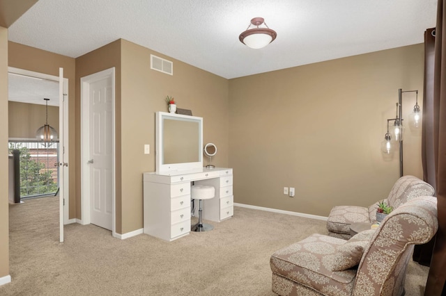 4323 Victor Path Unit 1, Hugo, MN 55038 - sitting room featuring a desk, carpet, a chandelier, and baseboards