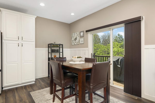 4323 Victor Path Unit 1, Hugo, MN 55038 - dining area with a wainscoted wall, dark wood-style floors, a decorative wall, and recessed lighting