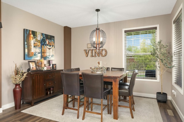 4323 Victor Path Unit 1, Hugo, MN 55038 - dining room with a chandelier and wood finished floors