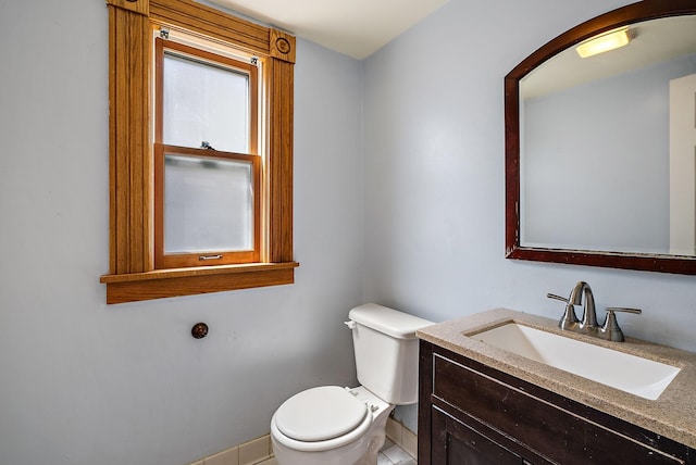 2911 California St NE, Minneapolis, MN 55418 - half bath with toilet, vanity, and baseboards