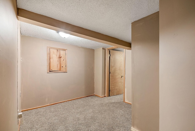 2911 California St NE, Minneapolis, MN 55418 - finished basement with carpet, a textured ceiling, and baseboards