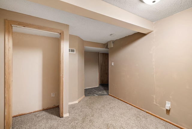 2911 California St NE, Minneapolis, MN 55418 - finished basement featuring carpet, baseboards, and a textured ceiling