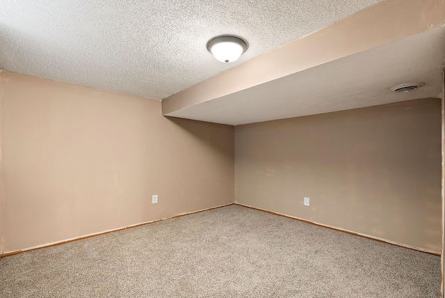 2911 California St NE, Minneapolis, MN 55418 - finished basement with carpet, a textured ceiling, and baseboards