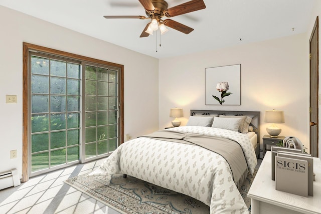 1031 Pheasant Trl, Hudson, WI 54016 - bedroom with access to exterior, a baseboard radiator, and a ceiling fan