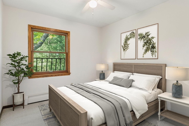 1031 Pheasant Trl, Hudson, WI 54016 - carpeted bedroom with a baseboard heating unit, ceiling fan, and baseboards