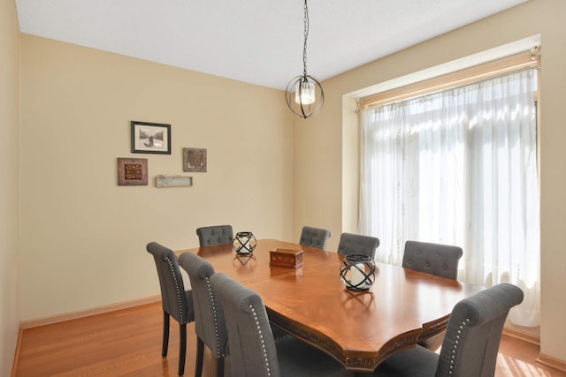 12625 Tiffany Ct, Burnsville, MN 55337 - dining area with light wood finished floors and baseboards