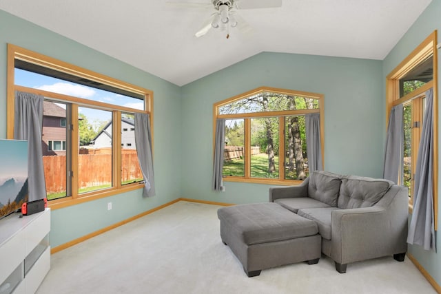 12625 Tiffany Ct, Burnsville, MN 55337 - living area with plenty of natural light, ceiling fan, carpet, baseboards, and lofted ceiling