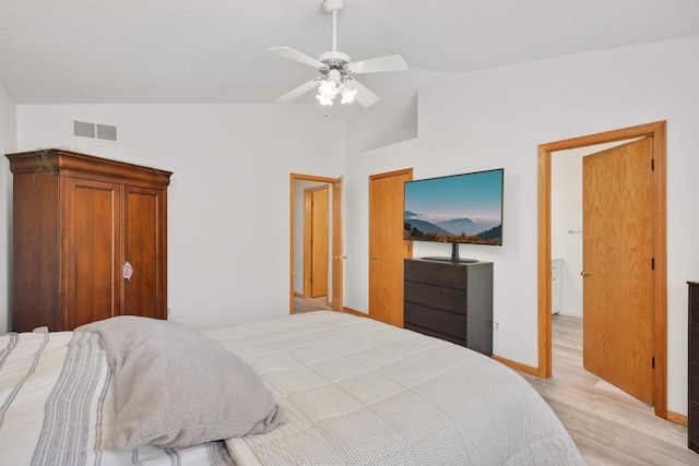 12625 Tiffany Ct, Burnsville, MN 55337 - bedroom featuring vaulted ceiling, light wood finished floors, ceiling fan, and baseboards