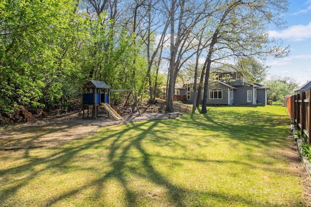 12625 Tiffany Ct, Burnsville, MN 55337 - view of green lawn featuring a playground