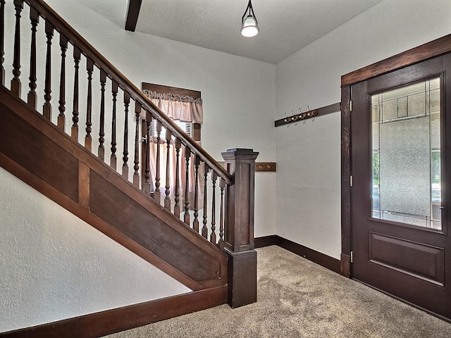 1501 Park St, Fairmont, MN 56031 - carpeted entrance foyer with healthy amount of natural light, baseboards, and stairway