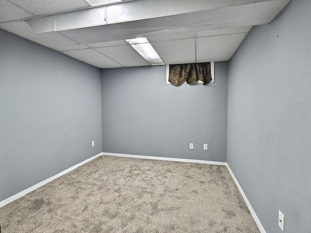 1501 Park St, Fairmont, MN 56031 - finished basement with a paneled ceiling, carpet, and baseboards