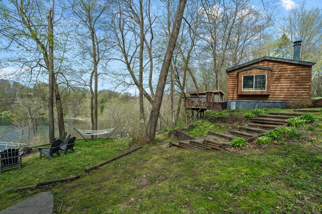 1651 Niles Ln N, Centuria, WI 54824 - view of yard with a wooden deck